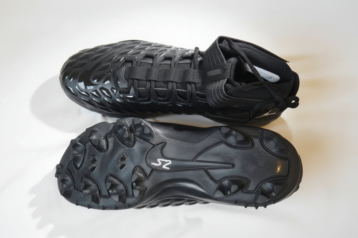 Nike Jordan Force Savage Pro 2 football cleats showing top view and outsole traction pattern